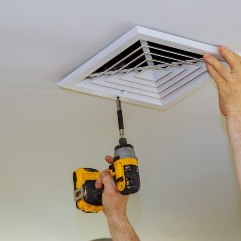 The process of installing mounting skin ceiling covered by plastic ventilation cover in Installation de ventilateurs de salle de bain